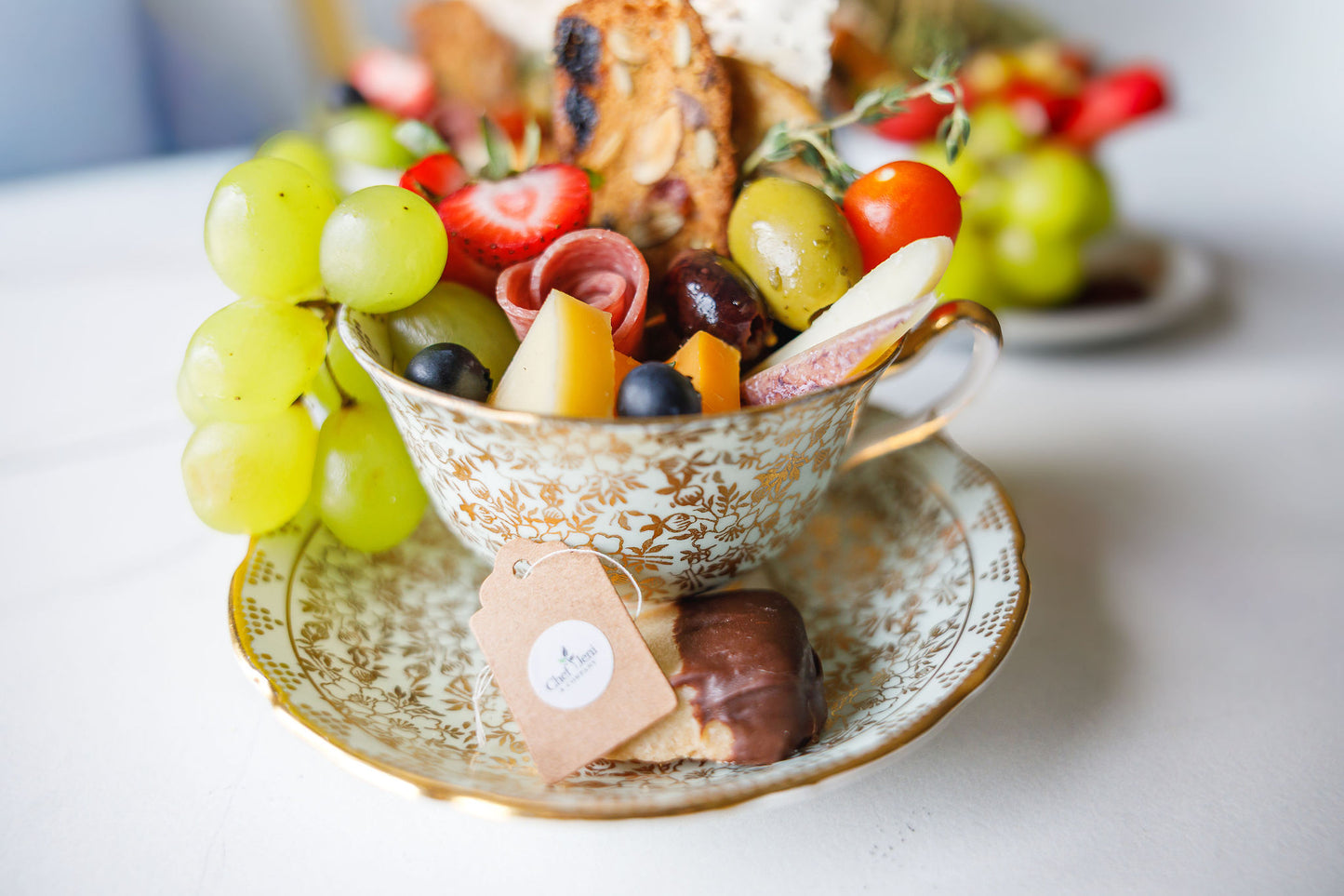 Vintage teacup charcuterie cup served for weddings, bridal showers, tea parties, and special events in Sioux Falls.